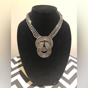 Woven patterned necklace